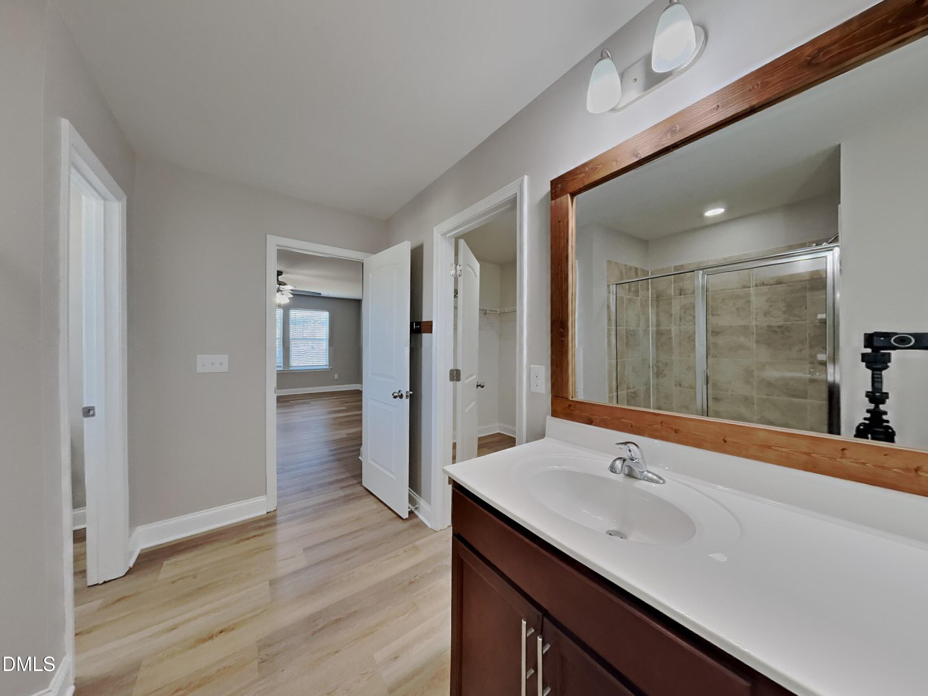 50 Gallery Park Drive Franklinton, NC 27525 - Photo 9 of 18 a bathroom with a sink and a mirror