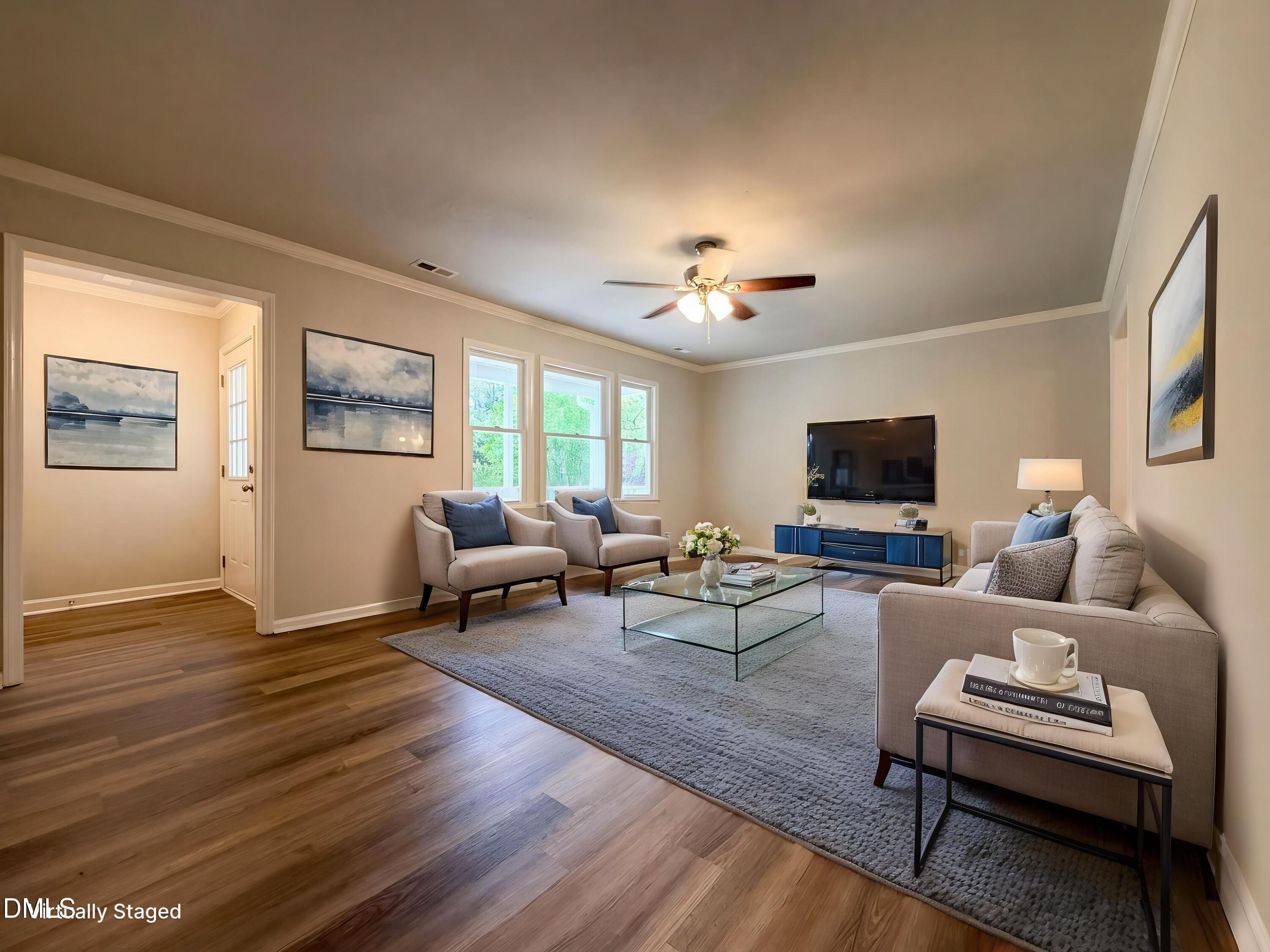 4894 Elevation Road, Unit C Benson, NC 27504 - Photo 5 of 24 a living room with furniture and a flat screen tv