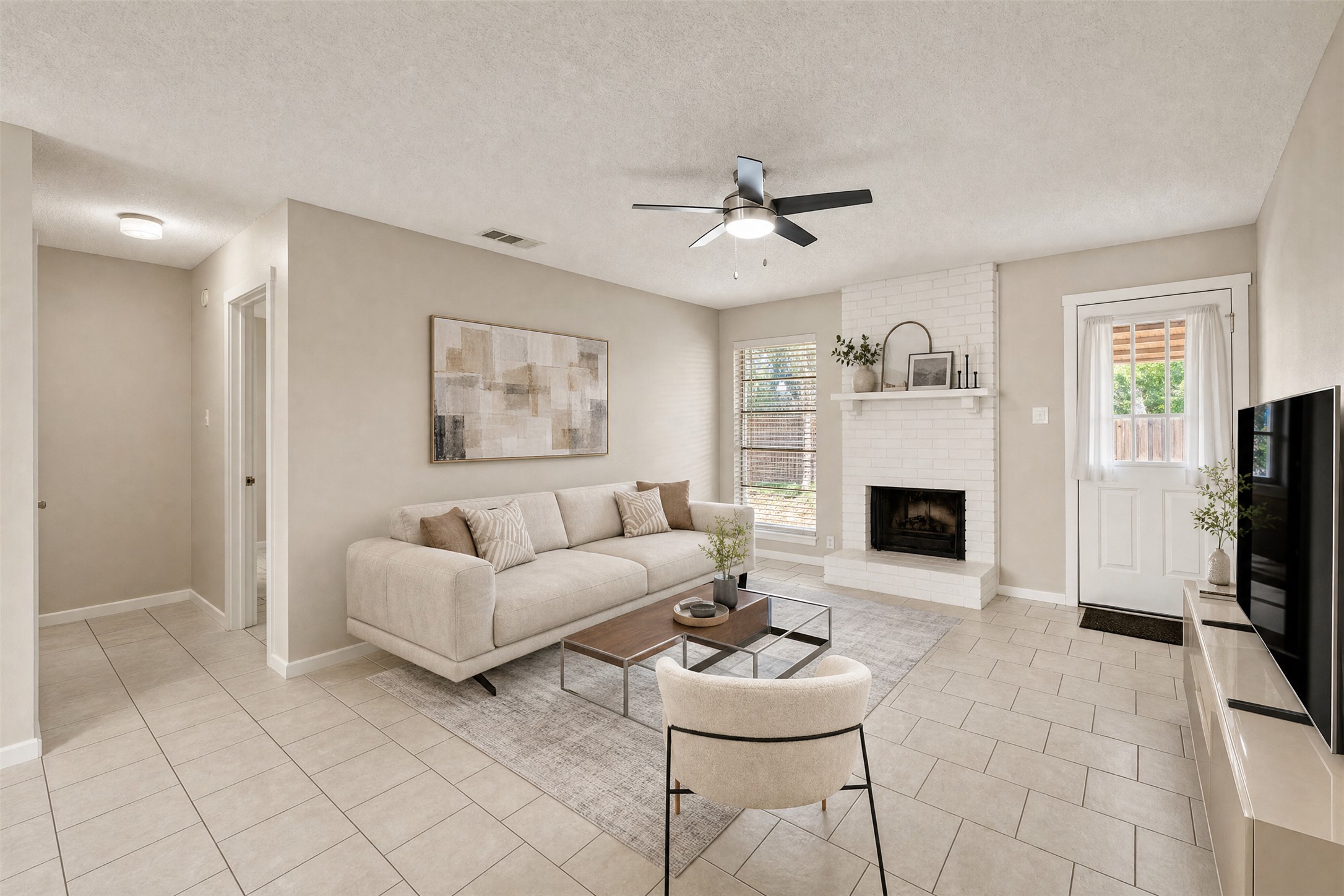 2311 Burleson Road, Unit B Austin, TX 78741 - Photo 6 of 24 Spacious family room and cozy fireplace. Virtually staged