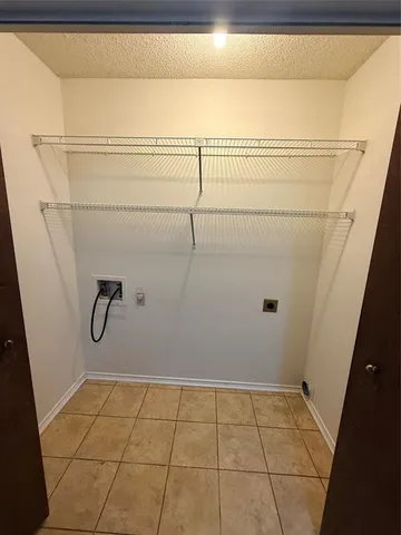 a kitchen with a sink a stove and refrigerator