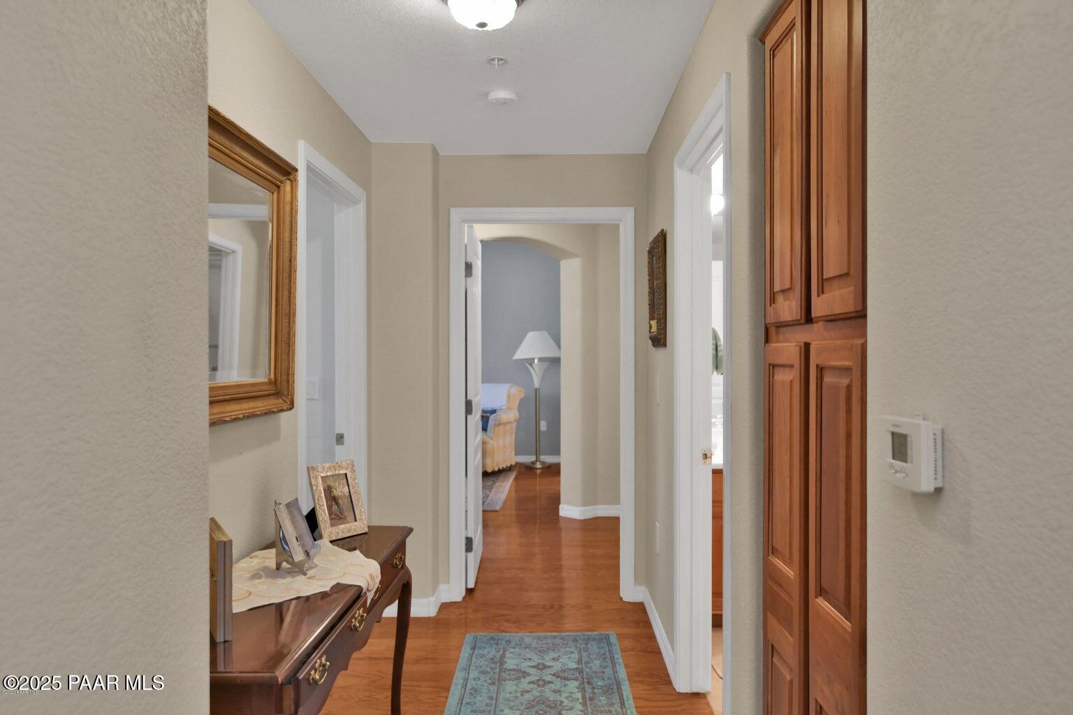 1716 Alpine Meadows Lane, Unit 1007 Prescott, AZ 86303 - Photo 15 of 21 wooden floor in a gallery