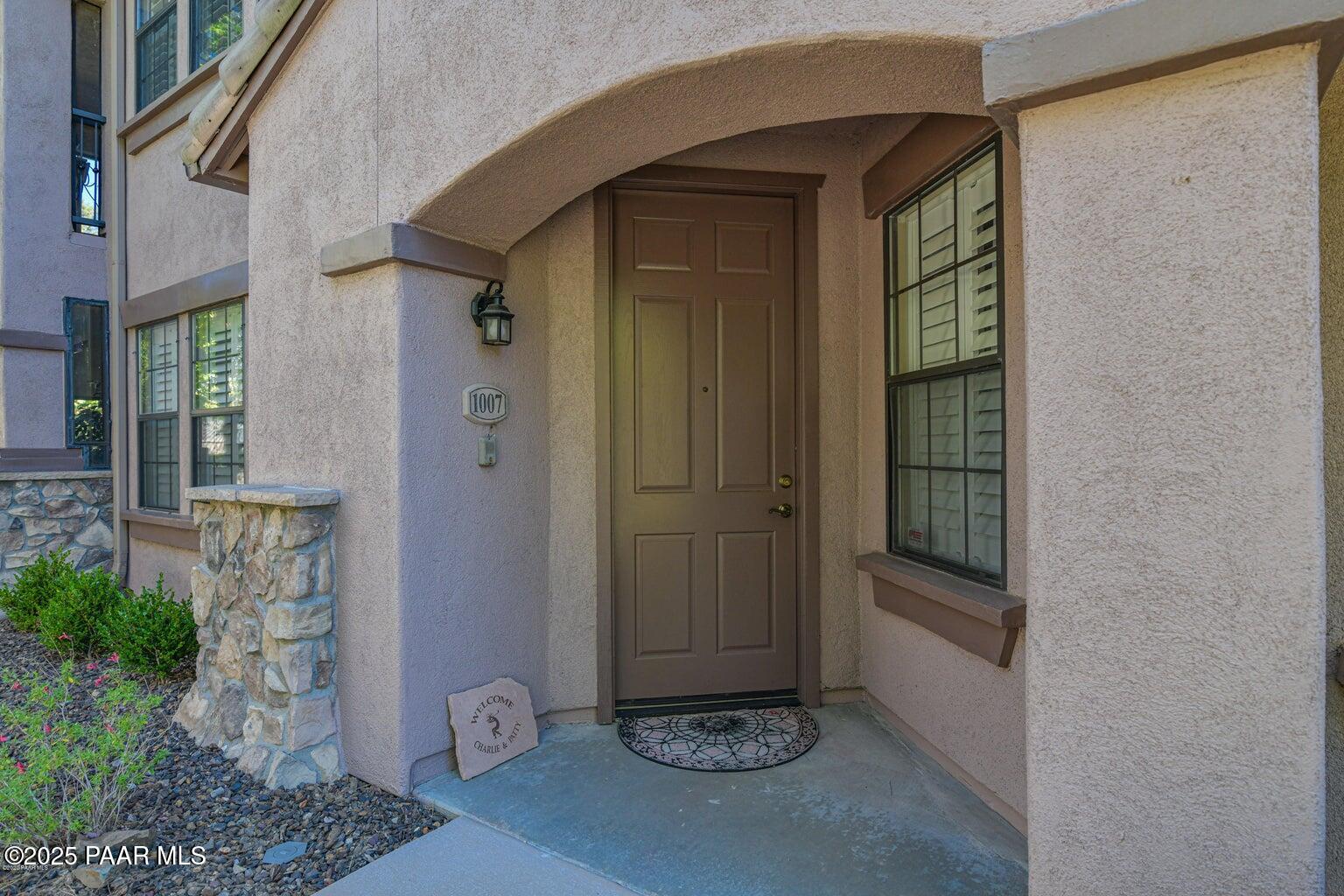 1716 Alpine Meadows Lane, Unit 1007 Prescott, AZ 86303 - Photo 4 of 21 a view of a front door of the house
