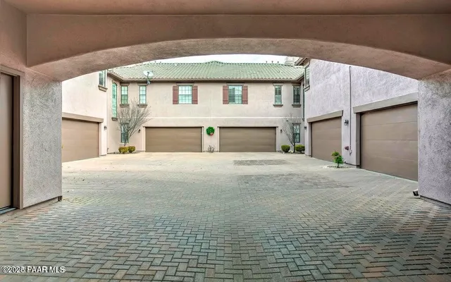a view of backyard of a house