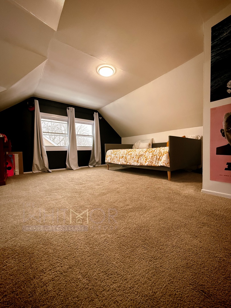 277 West Raye Drive Chicago Heights, IL 60411 - Photo 11 of 12 a view of a livingroom with furniture and window