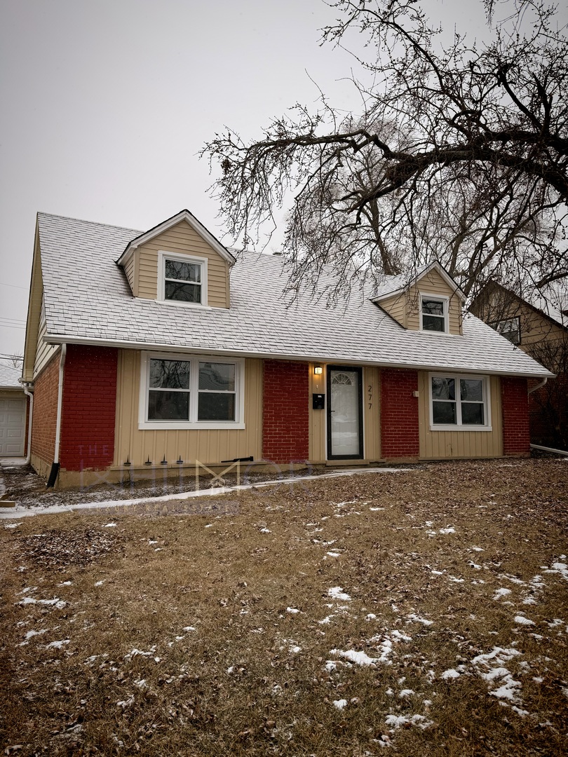 277 West Raye Drive Chicago Heights, IL 60411 - Photo 2 of 12 a front view of a house with a yard