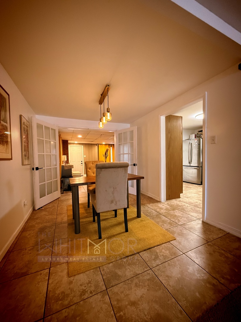 277 West Raye Drive Chicago Heights, IL 60411 - Photo 4 of 12 a view of a livingroom with furniture and a kitchen