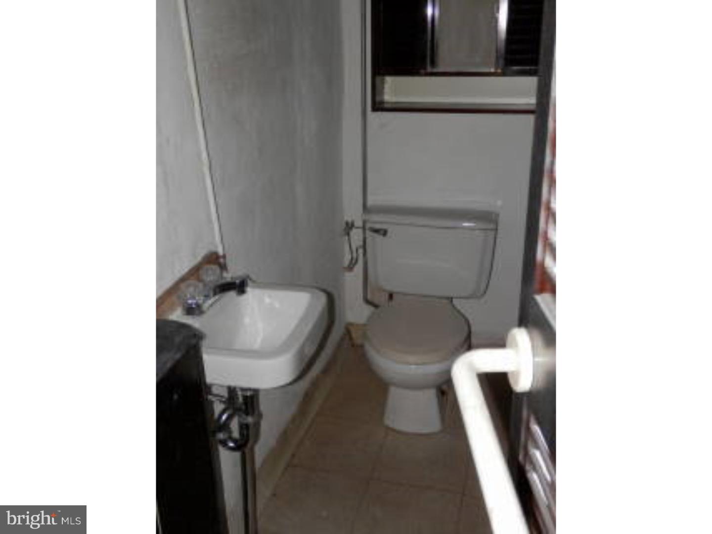 4455 Sherwood Road Philadelphia, PA 19131 - Photo 8 of 13 Half Bath