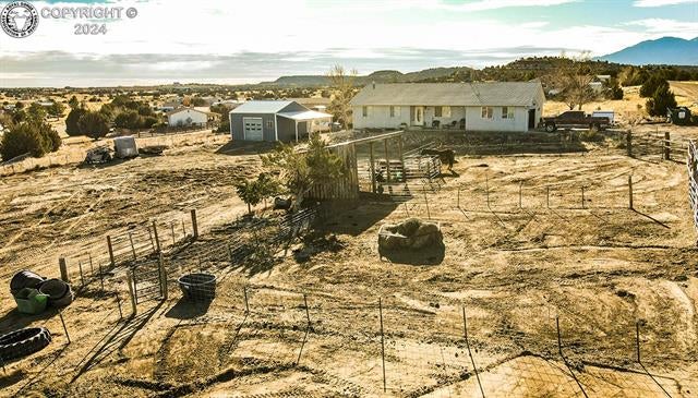 950 Quail Road Coal Creek, CO 81221 - Photo 2 of 36 View of yard with a mountain view and a rural view