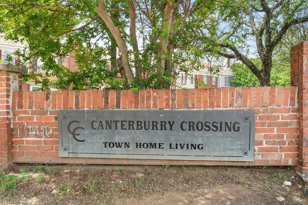 10500 Lake June Road, Unit I03 Dallas, TX 75217 - Photo 11 of 11 a view of outdoor space with signage and flags