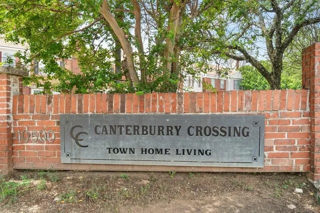 a view of outdoor space with signage and flags