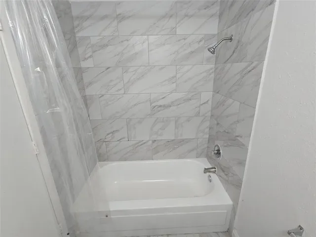 a bathroom with a bathtub