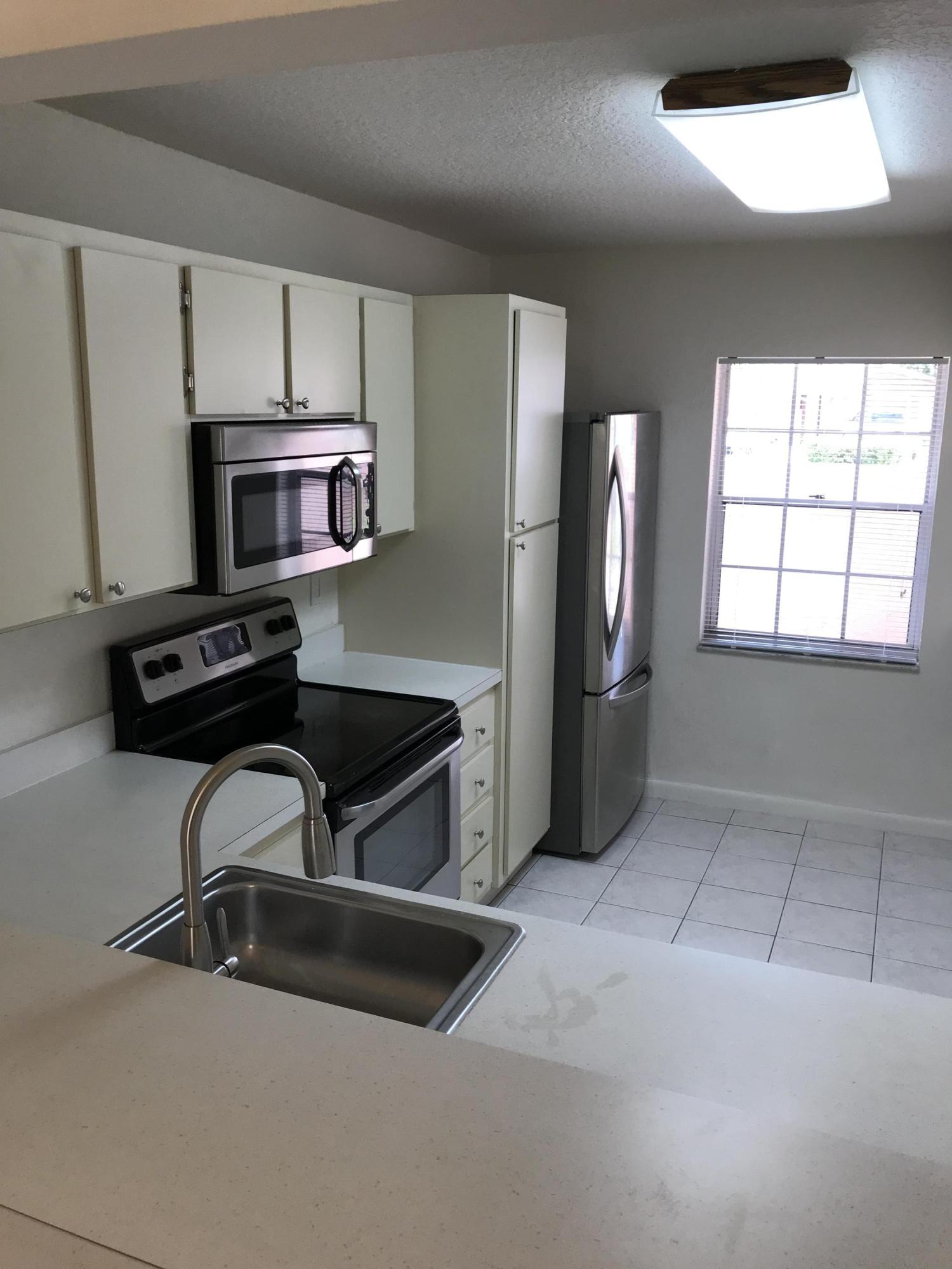 9945 Three Lakes Circle Boca Raton, FL 33428 - Photo 13 of 38 kitchen