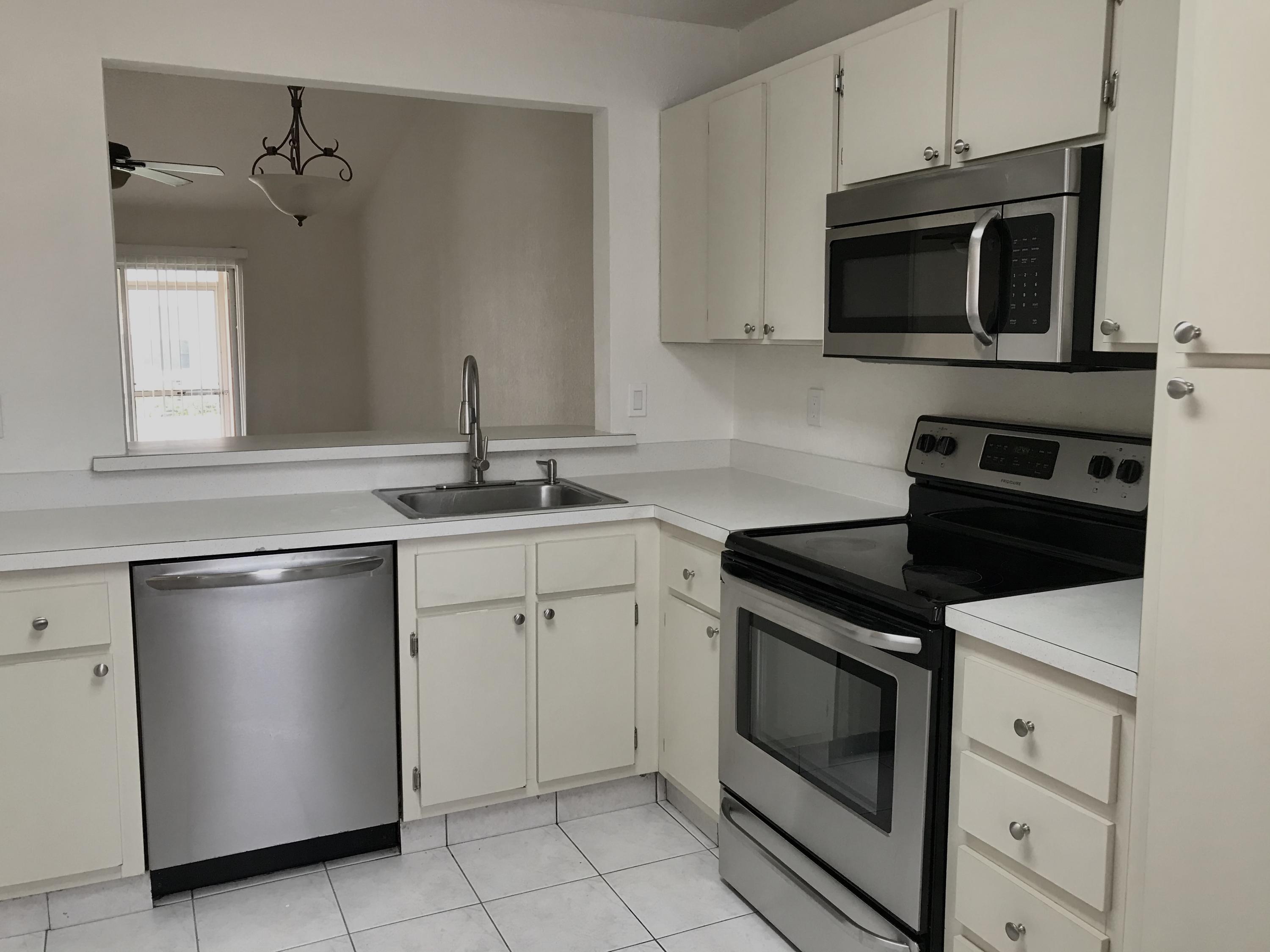 9945 Three Lakes Circle Boca Raton, FL 33428 - Photo 14 of 38 kitchen