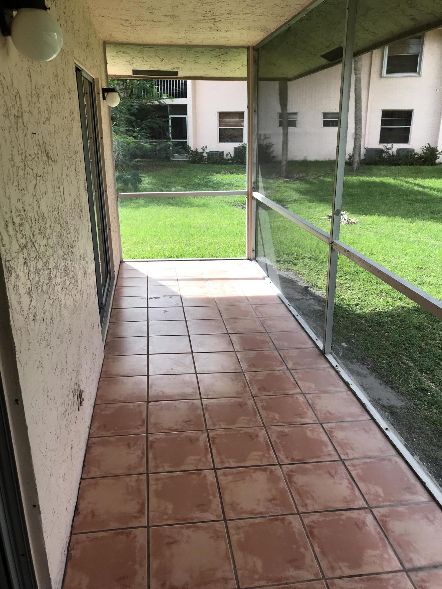 9945 Three Lakes Circle Boca Raton, FL 33428 - Photo 33 of 38 back patio