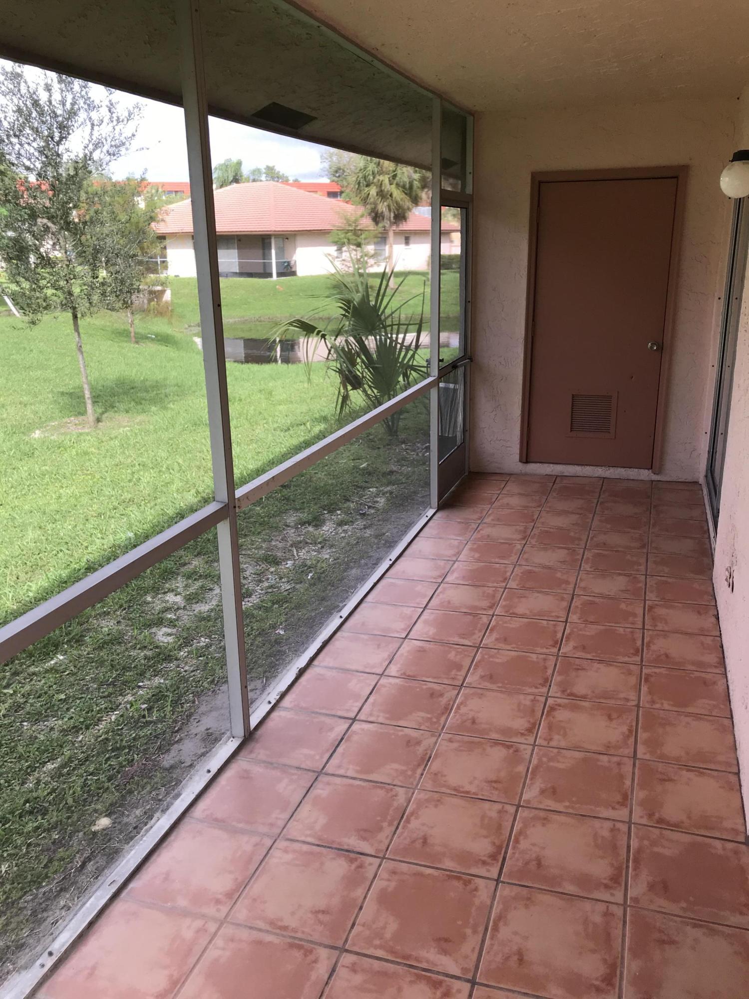 9945 Three Lakes Circle Boca Raton, FL 33428 - Photo 34 of 38 back patio