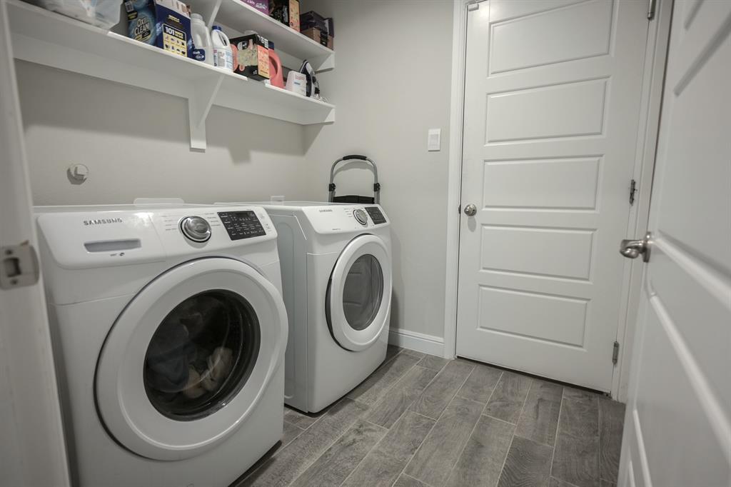 725 Golden Gate Pk Road Alvarado, TX 76009 - Photo 24 of 35 Handy shelves over washer/dryer