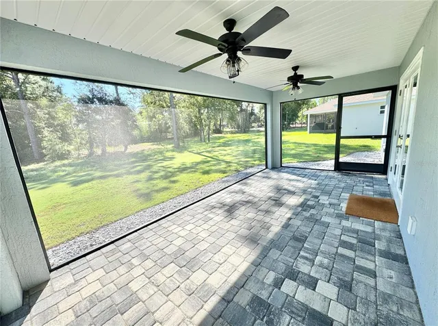 a view of swimming pool from a big room