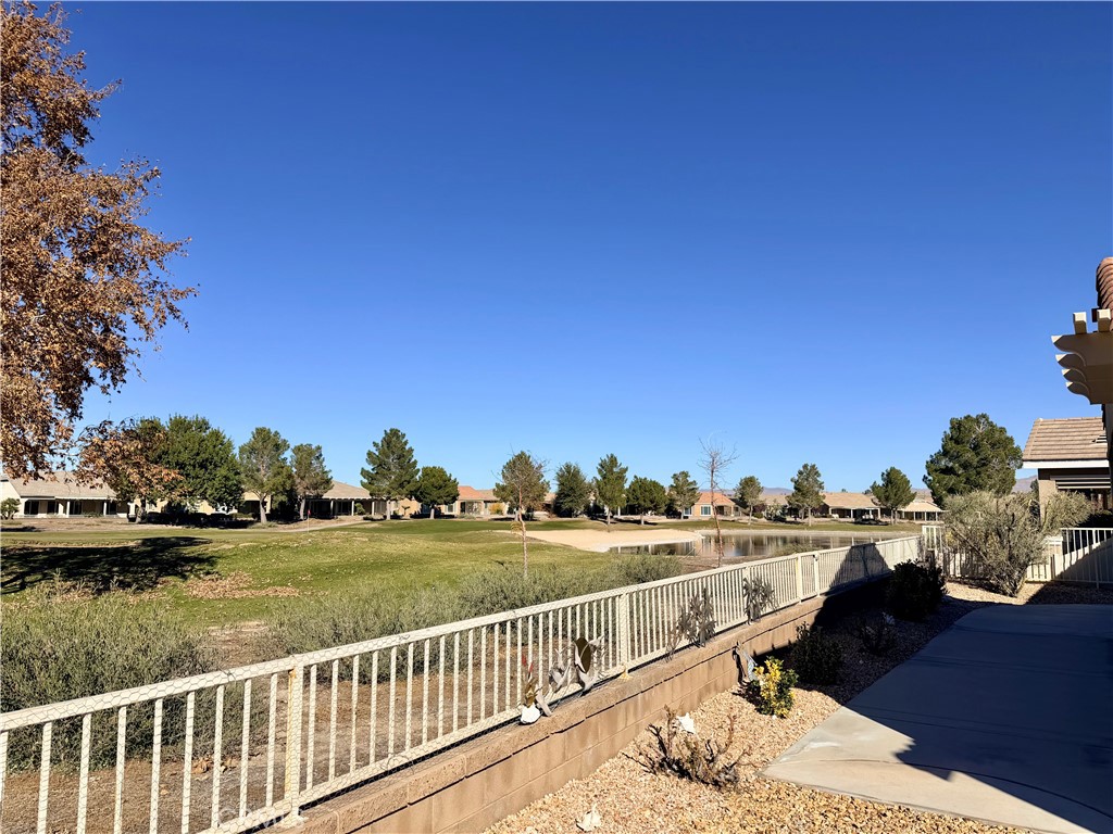 19422 Royal Oaks Road Apple Valley, CA 92308 - Photo 26 of 30 a view of a terrace with a garden