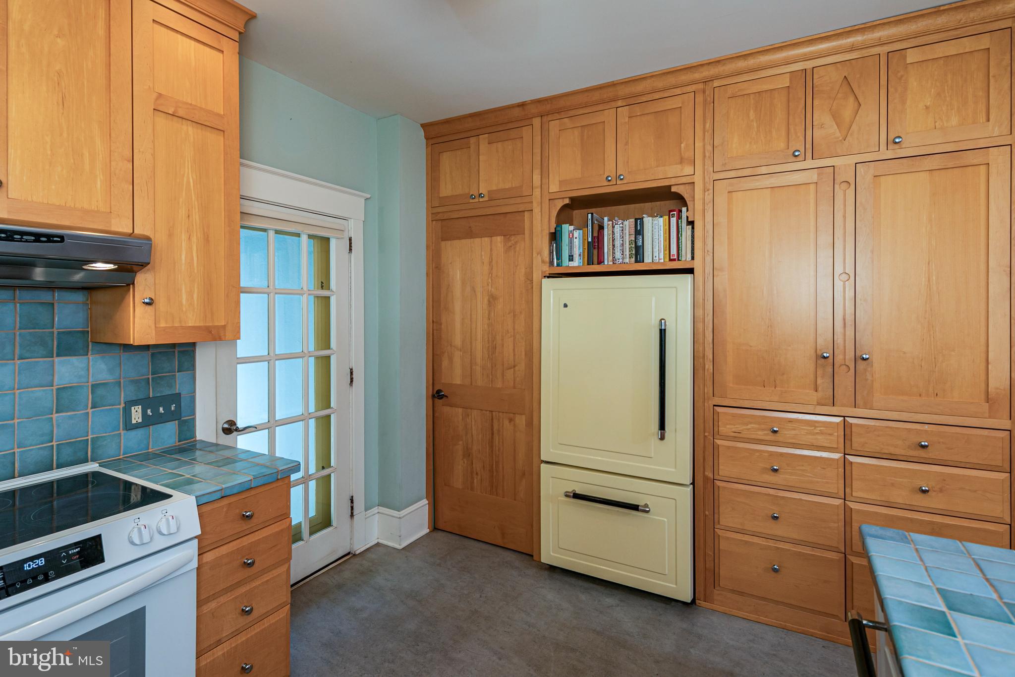 42 Markham Road Princeton, NJ 08540 - Photo 8 of 17 view of kitchen with granite countertop cabinets and wooden floor