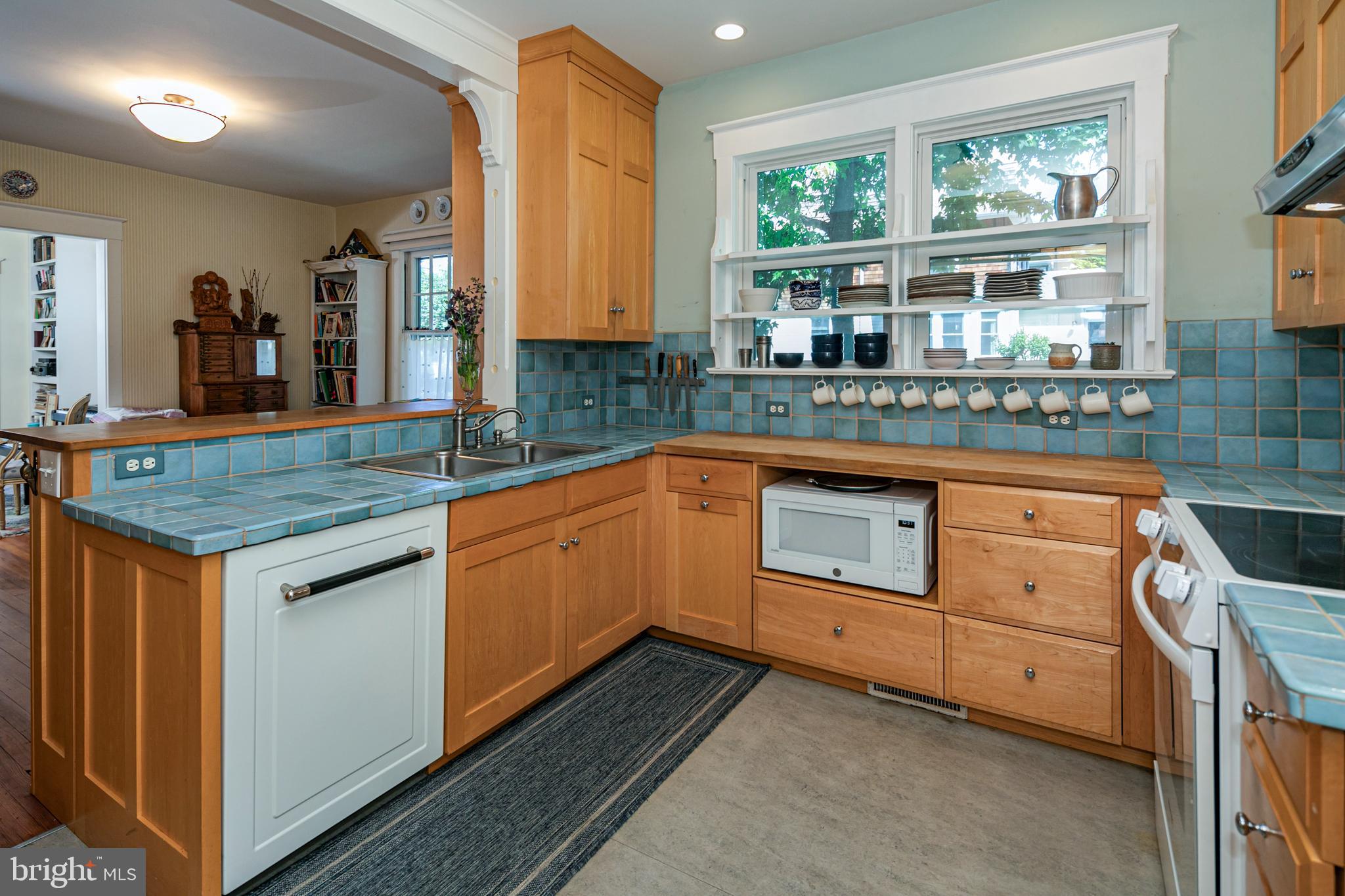 42 Markham Road Princeton, NJ 08540 - Photo 9 of 17 a kitchen with a stove a sink and a window