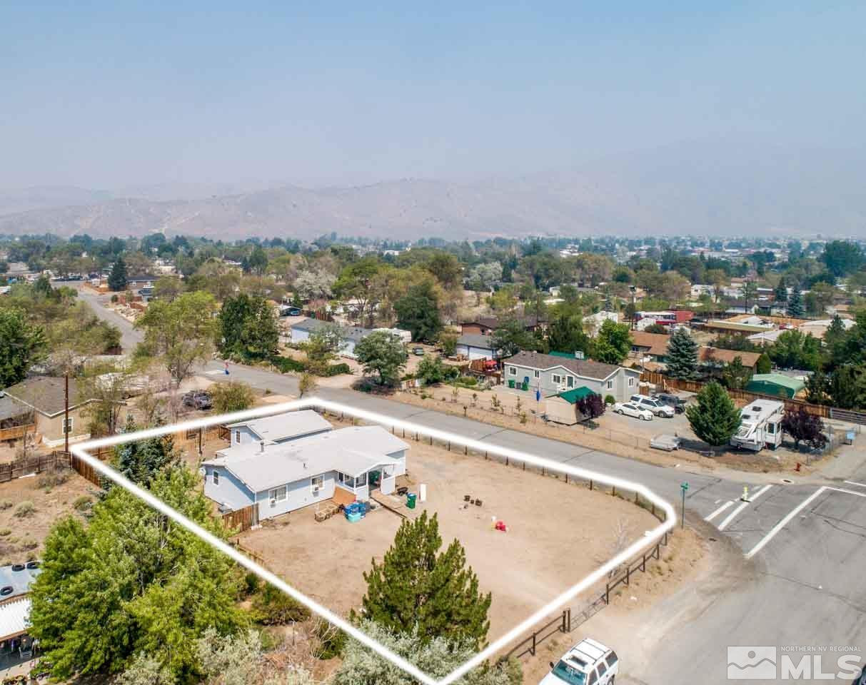 17500 Thrush Lane Reno, NV 89508 - Photo 3 of 18 an aerial view of a house with a swimming pool