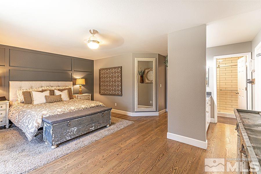 14545 Ghost Rider Drive Reno, NV 89511 - Photo 11 of 24 a bedroom with a bed and window