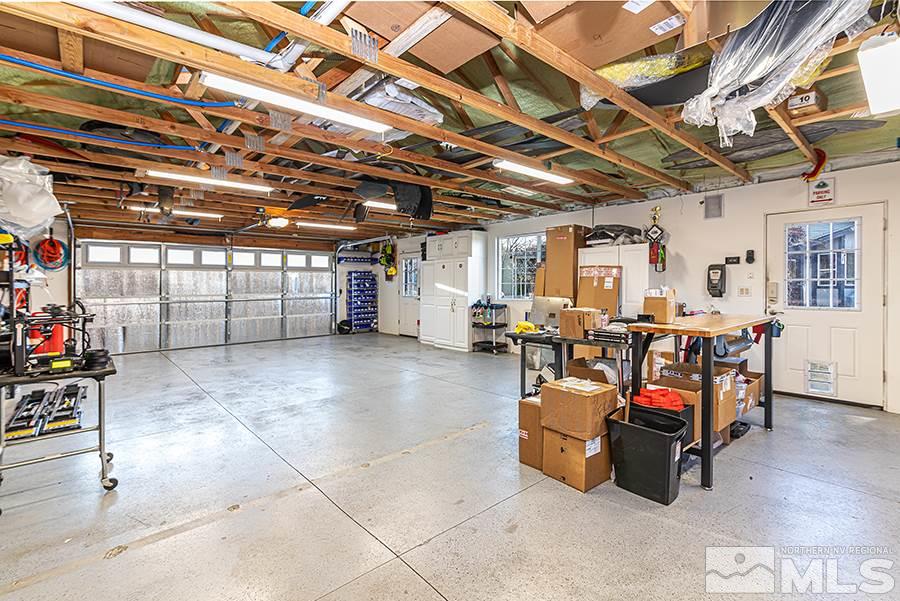 14545 Ghost Rider Drive Reno, NV 89511 - Photo 19 of 24 a outdoor space with lots of furniture and white walls