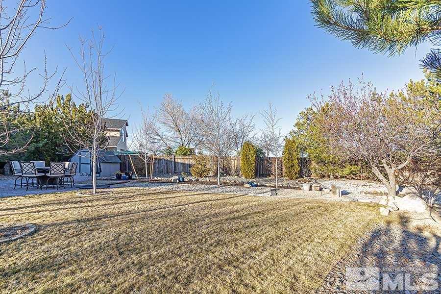14545 Ghost Rider Drive Reno, NV 89511 - Photo 22 of 24 a view of a houses with snow on the road