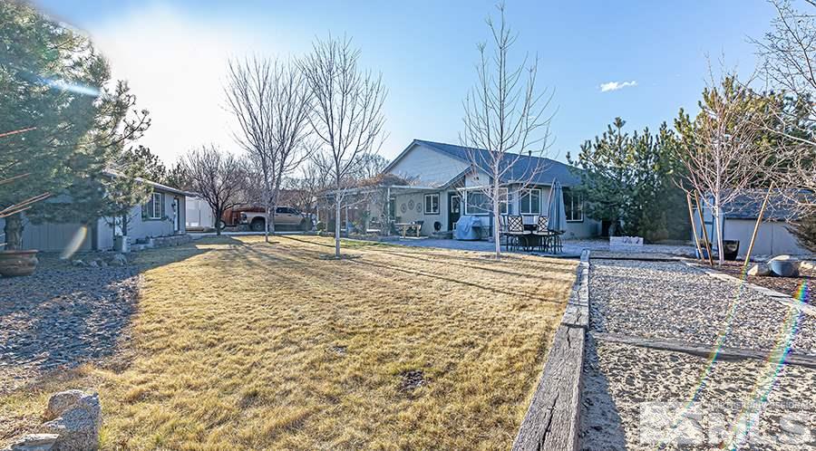 14545 Ghost Rider Drive Reno, NV 89511 - Photo 23 of 24 a view of a yard with a house