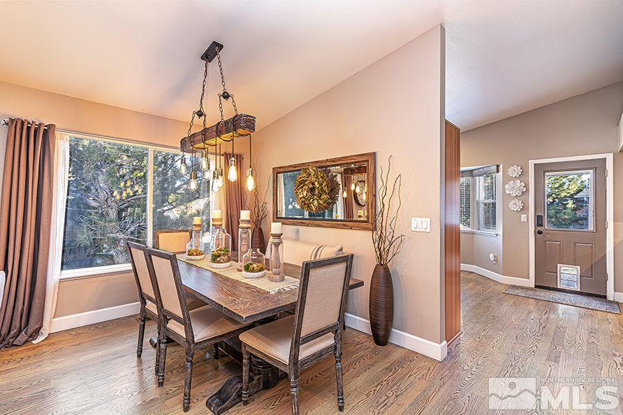 14545 Ghost Rider Drive Reno, NV 89511 - Photo 5 of 24 a dining room with furniture window wooden floor