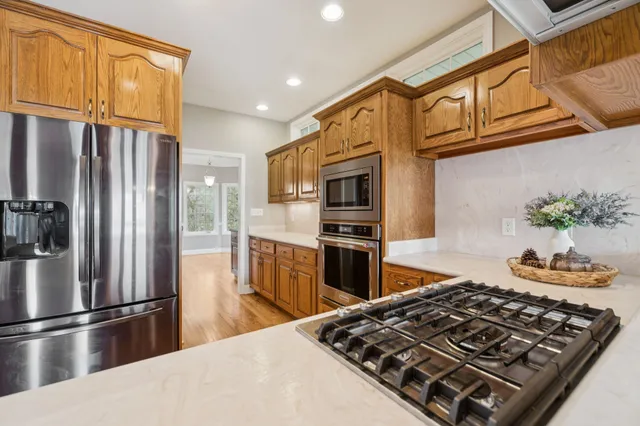a bathroom with a sink a mirror and a shower