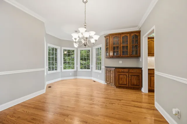a front view of a house with a garage