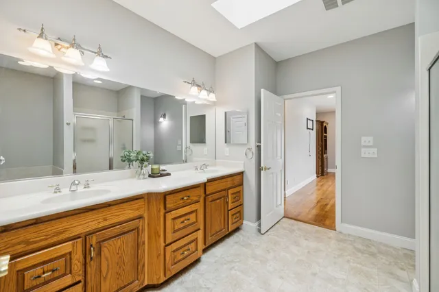 a view of a pathway both side of yard