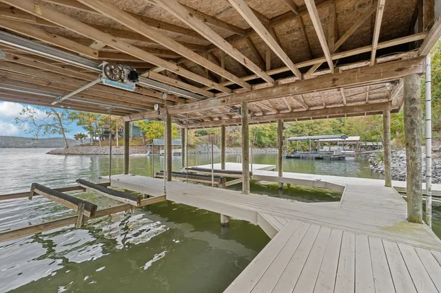 a kitchen with wooden cabinets and a sink