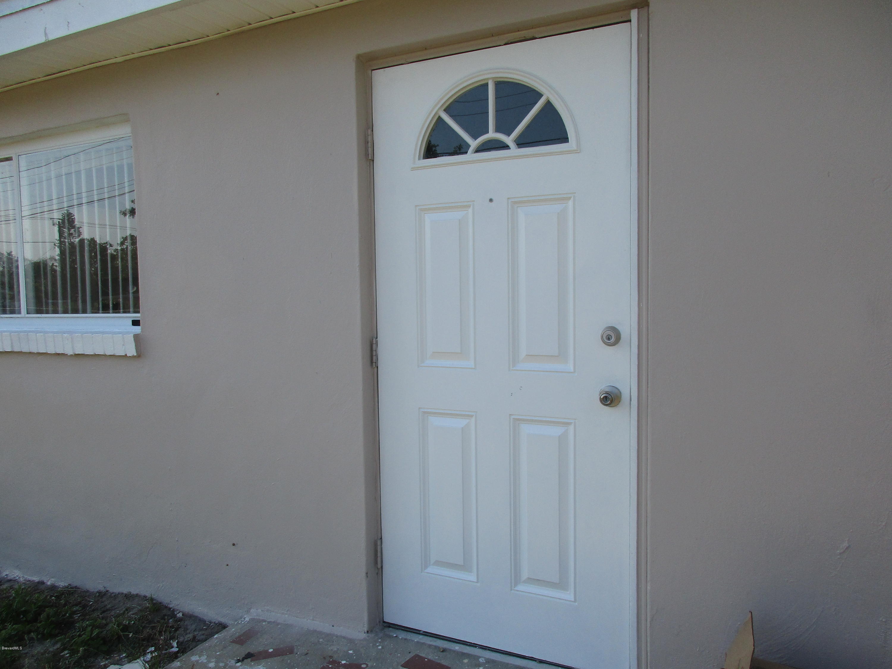 2768 North Breeze Road Melbourne, FL 32935 - Photo 4 of 28 IMG_0236