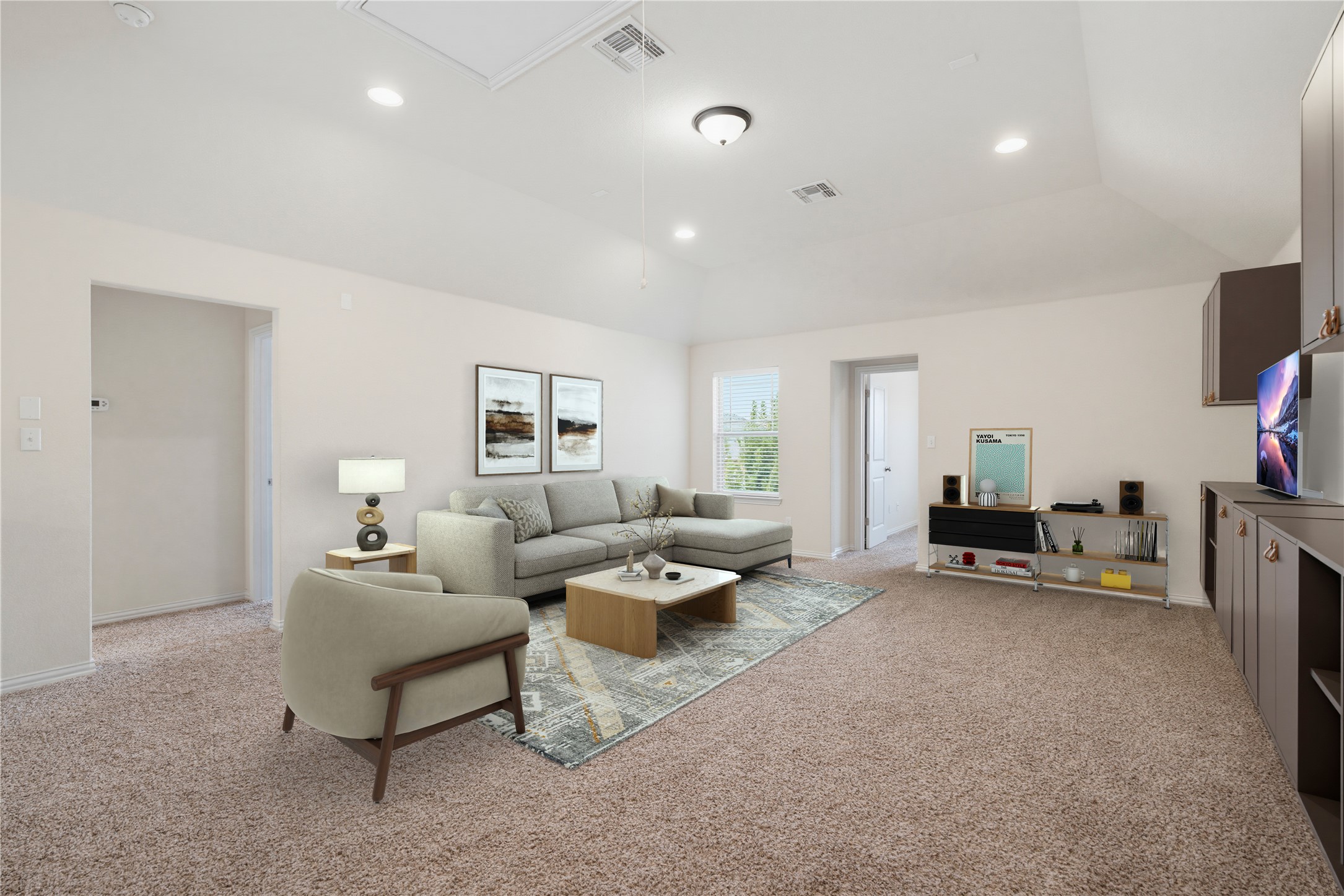 12613 Twisted Root Drive Manchaca, TX 78652 - Photo 20 of 33 A vaulted ceiling living room features carpeted floors, recessed lighting, and a neutral color palette.