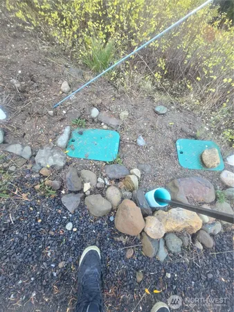 a view of a wooden table with chairs
