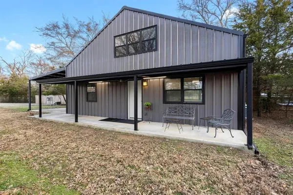 a house view with a outdoor space