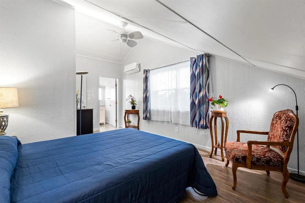 5019 North State Highway Bonham, TX 75418 - Photo 15 of 28 a bed room with a bed and a chair