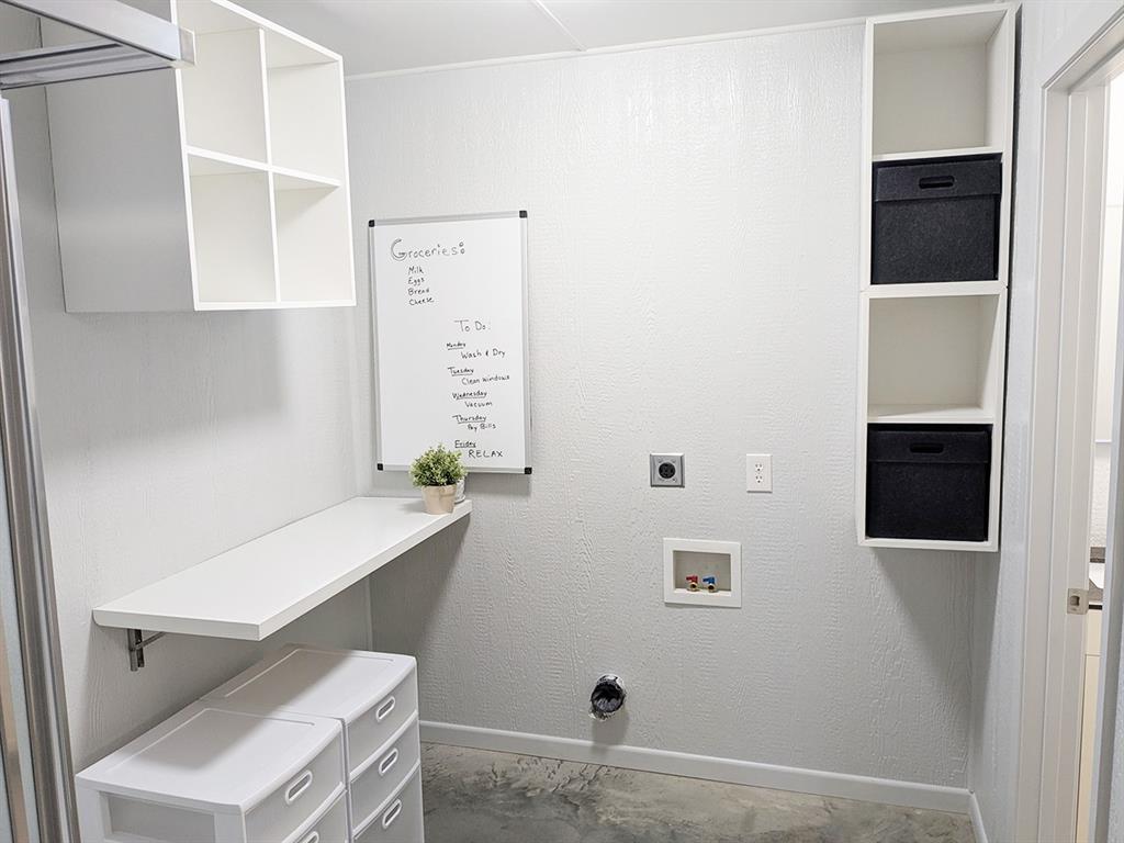 5019 North State Highway Bonham, TX 75418 - Photo 28 of 28 a bathroom with a sink and a mirror