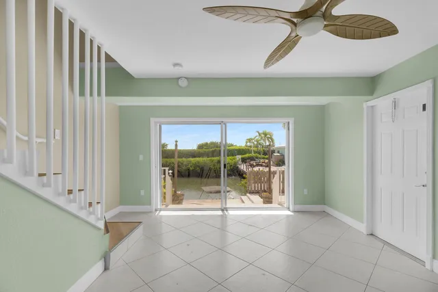 a kitchen with granite countertop a sink and a stove top oven