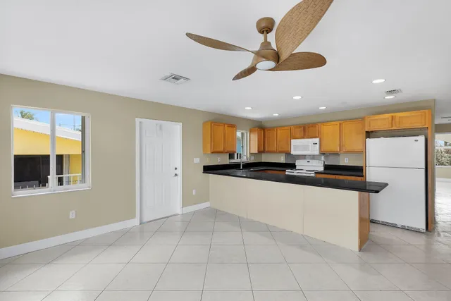 a view of a balcony with wooden floor