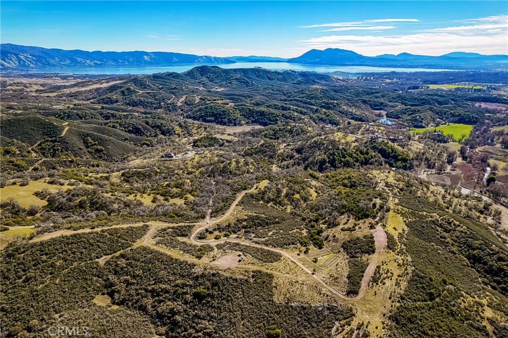 5553 Eickhoff Road Lakeport, CA 95453 - Photo 11 of 18 a view of a city with mountains in the background