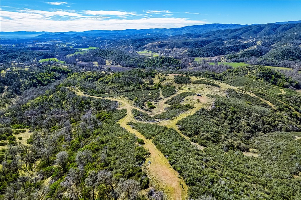 5553 Eickhoff Road Lakeport, CA 95453 - Photo 17 of 18 a view of a city with mountains in the background