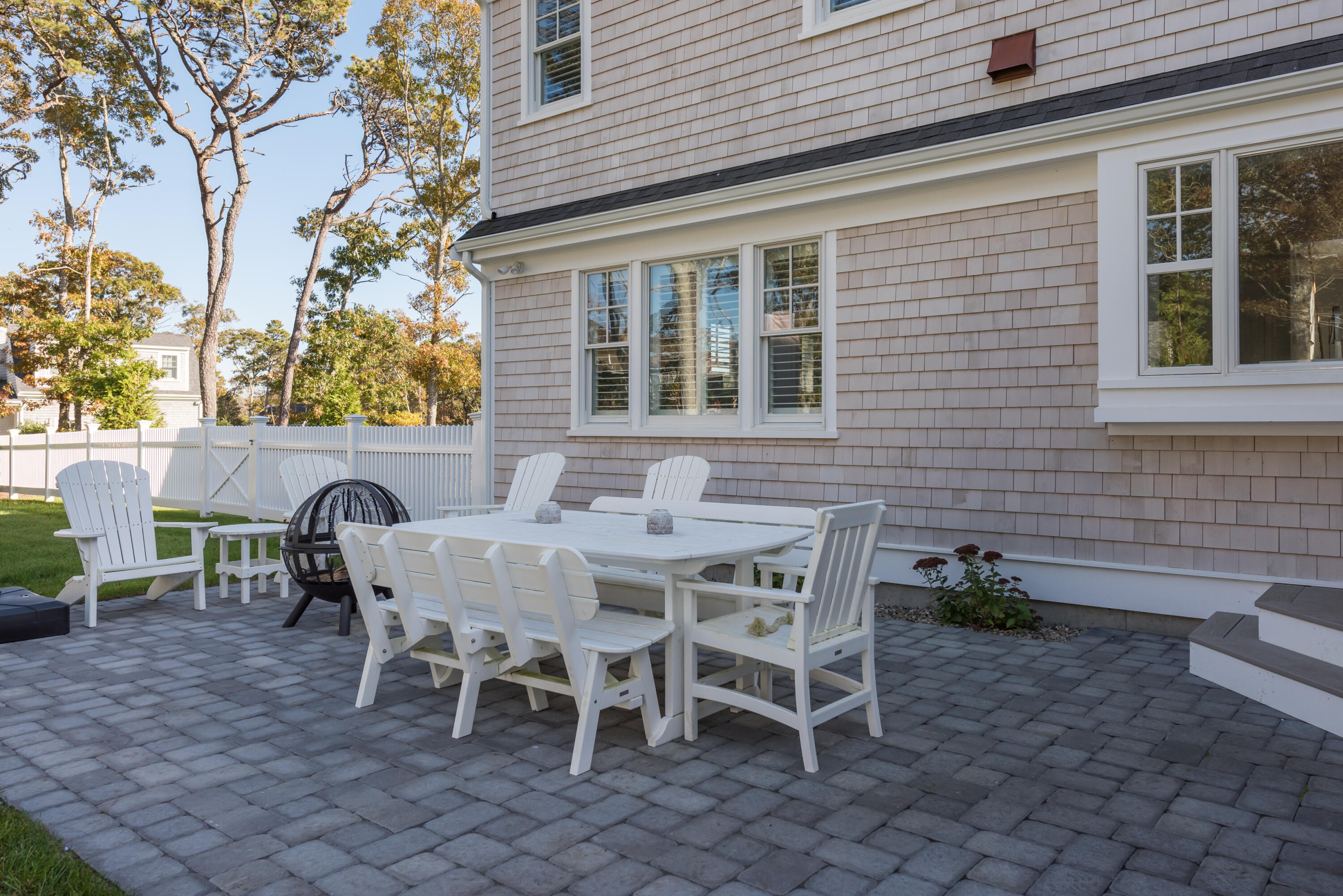 15 Bascom Hollow Harwich, MA 02645 - Photo 11 of 35 a patio with table and chairs
