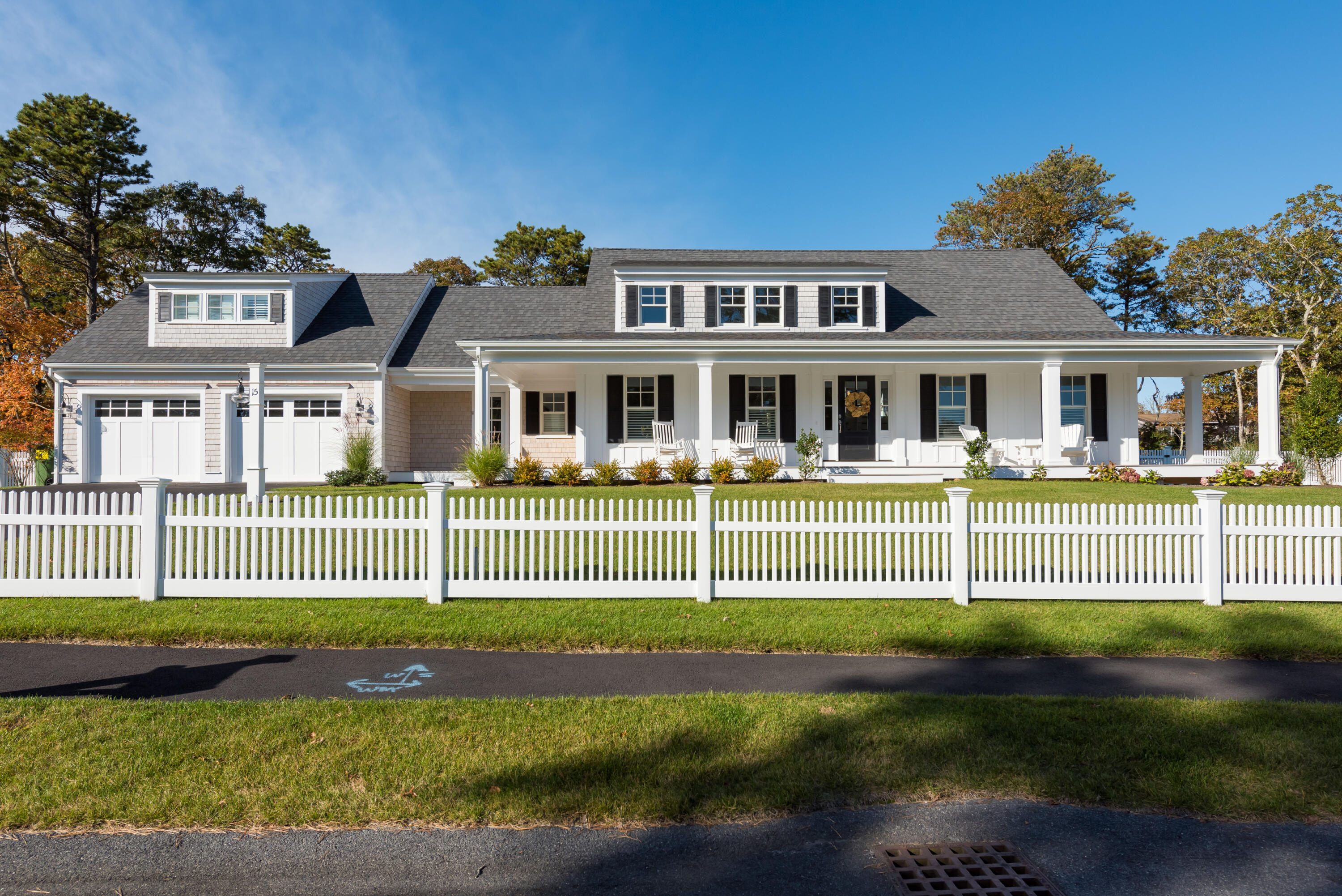 15 Bascom Hollow Harwich, MA 02645 - Photo 2 of 35 a front view of a house with a garden and plants