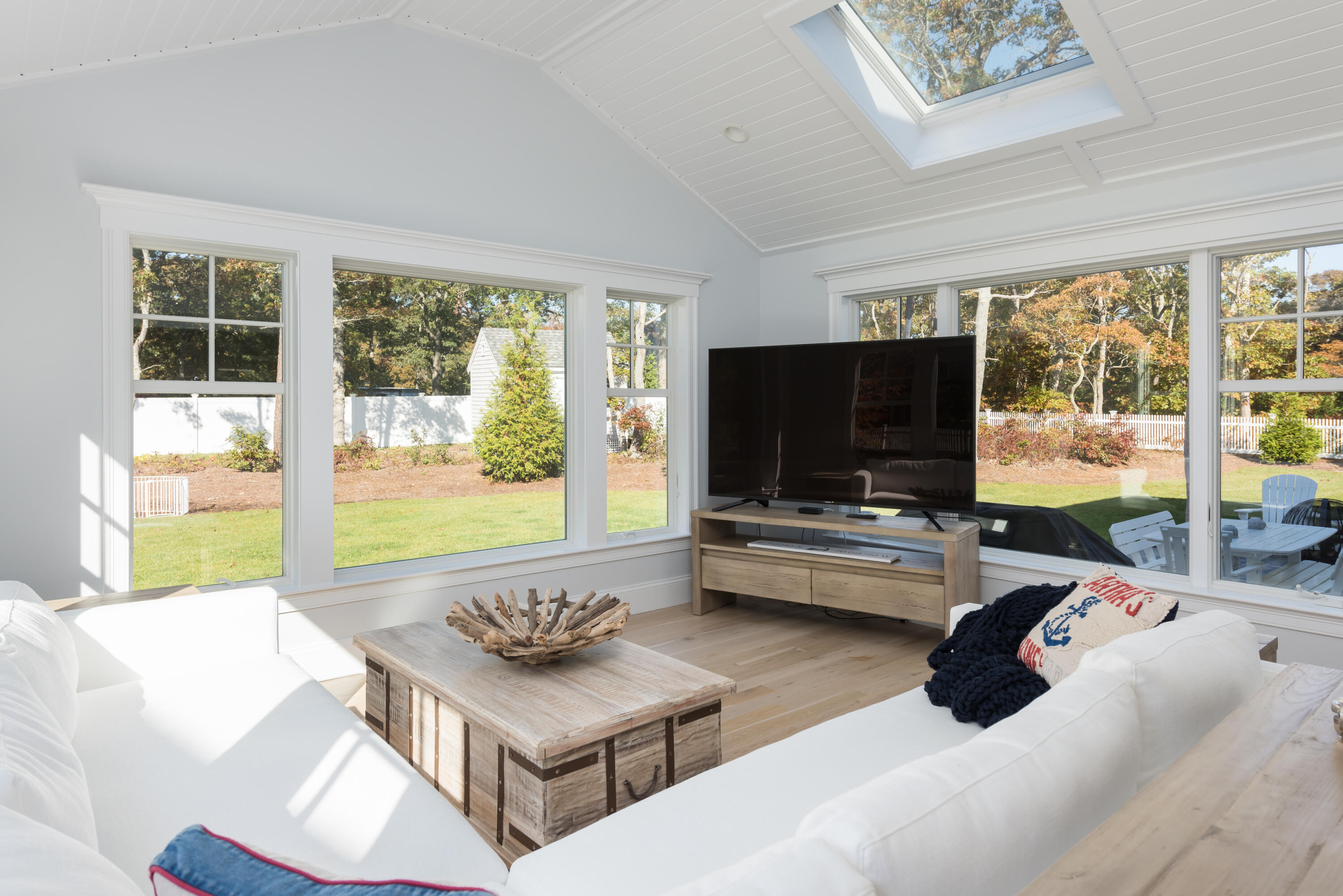 15 Bascom Hollow Harwich, MA 02645 - Photo 21 of 35 a living room with furniture and a flat screen tv