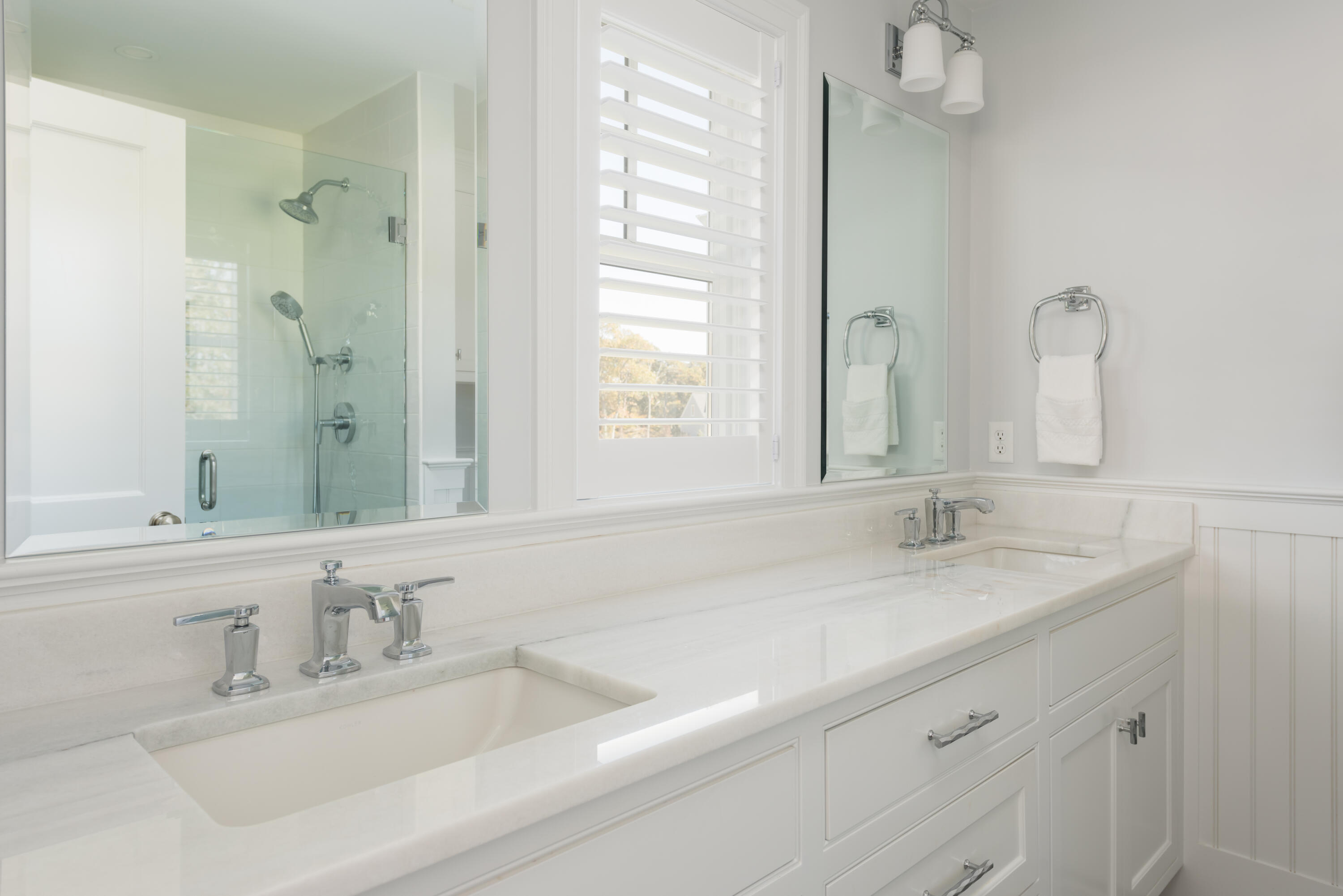 15 Bascom Hollow Harwich, MA 02645 - Photo 25 of 35 a bathroom with double vanity sink a mirror and a shower
