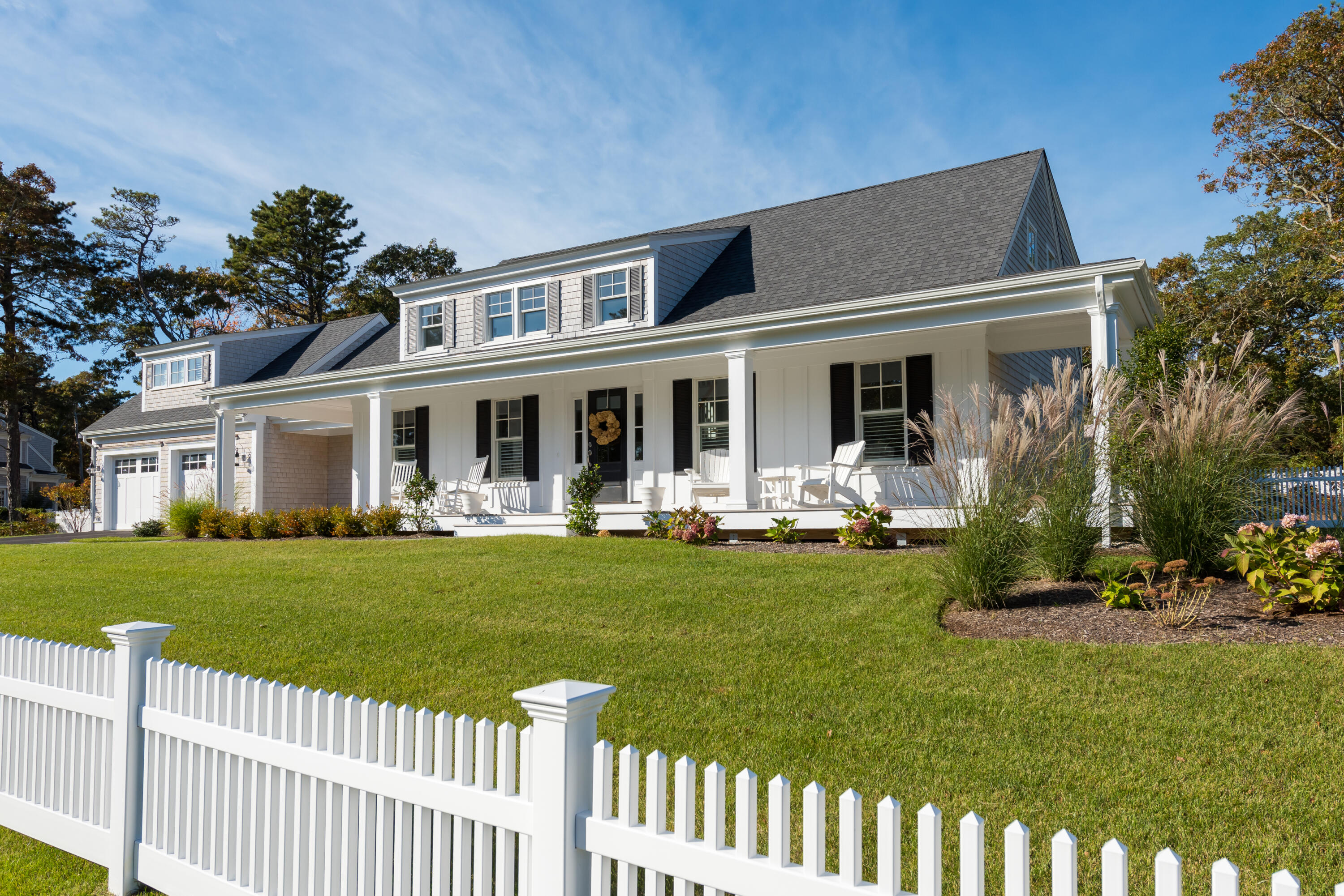 15 Bascom Hollow Harwich, MA 02645 - Photo 3 of 35 a front view of a house with a garden