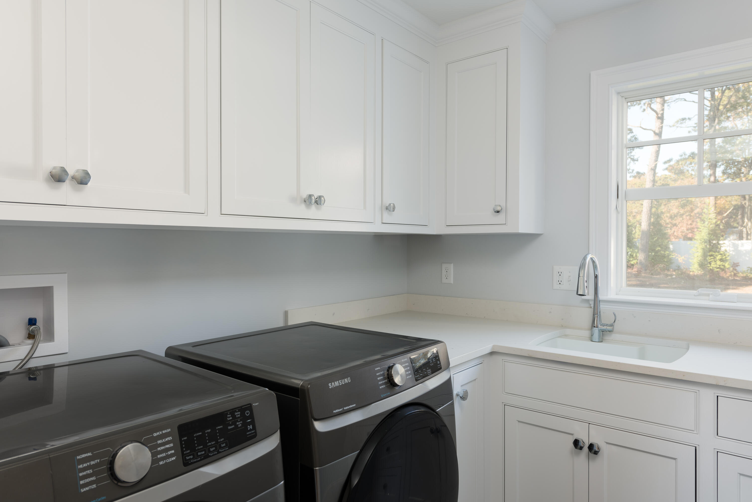 15 Bascom Hollow Harwich, MA 02645 - Photo 31 of 35 a kitchen with a sink and cabinets